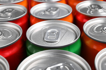 Energy drink in cans, closeup. Functional beverage