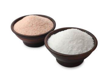 Different types of natural salt in bowls isolated on white