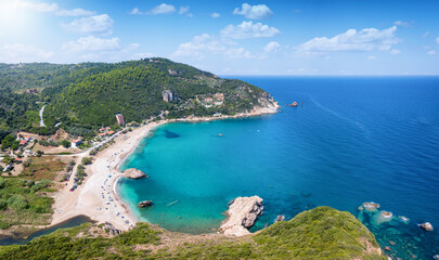 Panoramic aerial view of the beach of Paltsi, Mount Pelion, Greece, with turquoise sea and fine sand