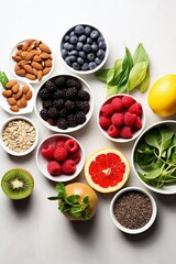 A variety of healthy food ingredients including fruits, vegetables, nuts, and seeds