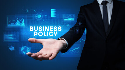Hand of Businessman holding motivational message