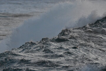the waves breaking on the coast and creating wonderful shapes