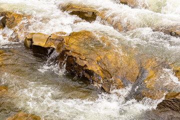 Wonderful landscape of mountain river and waterfall in Carpathians, Ukraine. Autumn landscape of river Prut in Yaremche.