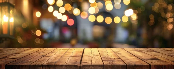 Fotobehang An inviting empty wooden tabletop with a soft bokeh of lights on a blurred restaurant background, setting a warm and welcoming atmosphere. © vadymstock