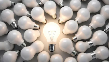 Möbelaufkleber 3d growing light bulb standing out from the unlit incandescent bulbs as leadership concept © Calin