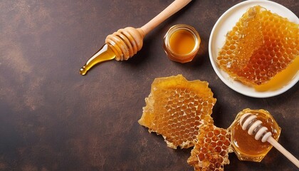 broken yellow honeycomb with honey on table. Honey products. healthy natural food concept - obrazy, fototapety, plakaty