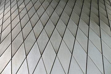 Modern background of silver rhombuses with gradient shadows