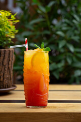 summer refreshing cocktail with orange juice