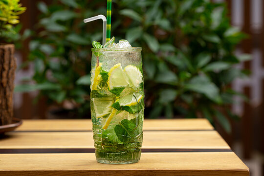 summer refreshing mojito cocktail with lime and mint