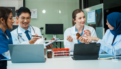 A diverse group of healthcare professionals, including doctors, nurses, and specialists, engaging in a collaborative meeting to discuss medical cases and share expertise in a hospital