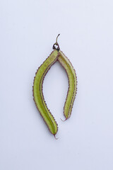 Purple winged bean vegetable (Psophocarpus tetragonolobus) on white background