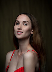 portrait of a young beautiful woman on a blurred background - 756433672