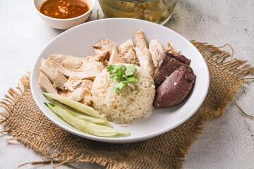 Hainanese chicken rice or rice steamed with chicken soup - Asian food style