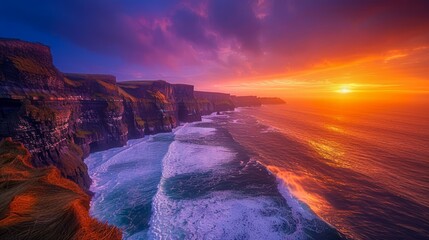Majestic Sunset Over Rugged Ocean Cliffs and Waves Under Vibrant Sky - Natural Coastal Landscape