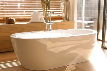 Luxury Modern Bathtub in a Cozy White Bathroom Interior with Clean Design and Elegant Faucet