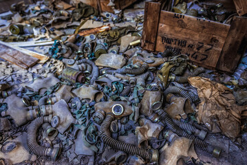 Old gas masks in 3rd High school in Pripyat abandoned city, Chernobyl Exclusion Zone in Ukraine