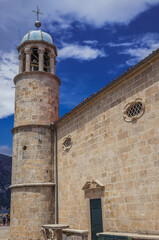 Fototapeta na wymiar Church on Our Lady of the Rocks Island near Perast town, Kotor Bay, Montenegro