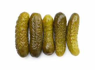 Tasty pickled cucumbers isolated on white, top view