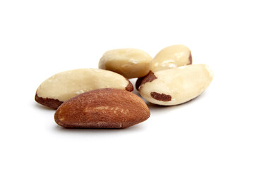 Fototapeta na wymiar A selective focus image of shelled Brazil nuts isolated against a white background