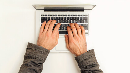 Man's hands typing on laptop keyboard, white background, symbolizing productivity and business communication.