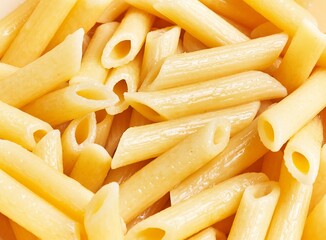 Close-up view of cooked pasta, showcasing the texture and simplicity of the italian cuisine staple.