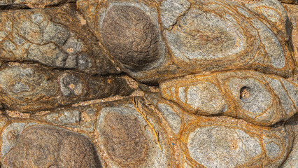 close up of a texture beach stones, natural granite 