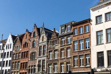 Fototapeta na wymiar Antwerp, Belgium. 15 April 2023. Brick facades of Antwerp, old historical buildings in the centre of the city.