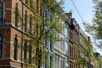 Antwerp, Belgium. 15 April 2023. Brick facades of Antwerp, old historical buildings in the centre...