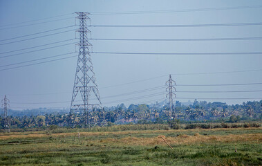 power lines in the field, electrical pylons , towers