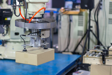 The paper box container handling process by robotic system.