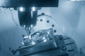 The 5-axis CNC milling machine  cutting the mold part with solid ball end mill tool in the light blue scene.