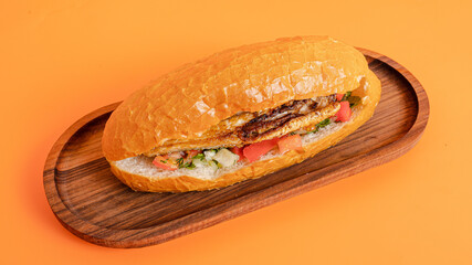 Beef doner kebab isolated on orange background