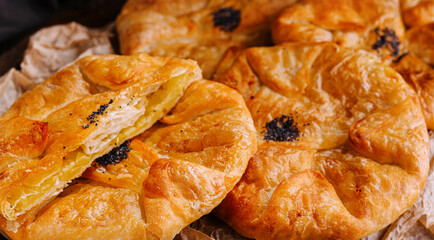 Cooking traditional pies with potatoes close up