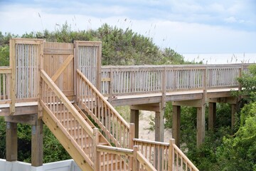 Fototapeta premium wooden bridge stairs built for beach access