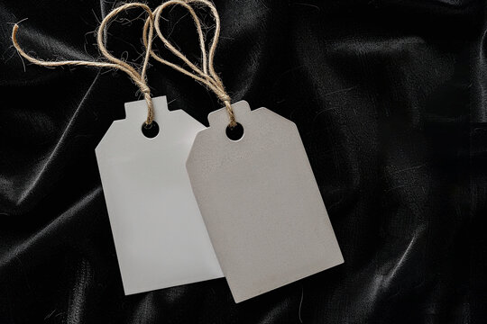 Tag mockup price tag, label design of brand tag, hanging and clothing tag on black background.