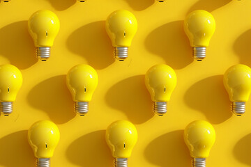 Yellow light bulb pattern with shadow