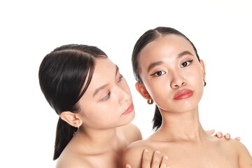 Two young beautiful Asian women