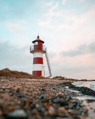 Leuchtturm am Strand Sonnenuntergang