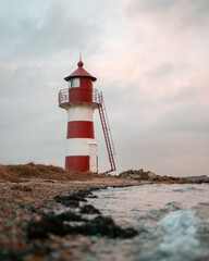 Leuchtturm am Strand Sonnenuntergang