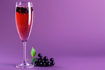 Kir Royale with a blackcurrant liqueur, isolated on a luxurious royal purple background, evoking elegance and celebration