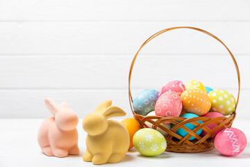 Easter eggs on a bright background. Easter celebration concept. Colorful easter handmade decorated Easter eggs. Place for text. Copy space.