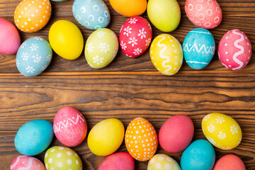 Easter eggs on a bright background. Easter celebration concept. Colorful easter handmade decorated Easter eggs. Place for text. Copy space.