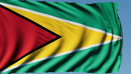 Close-up of the national flag of Guyana flutters in the wind on a sunny day