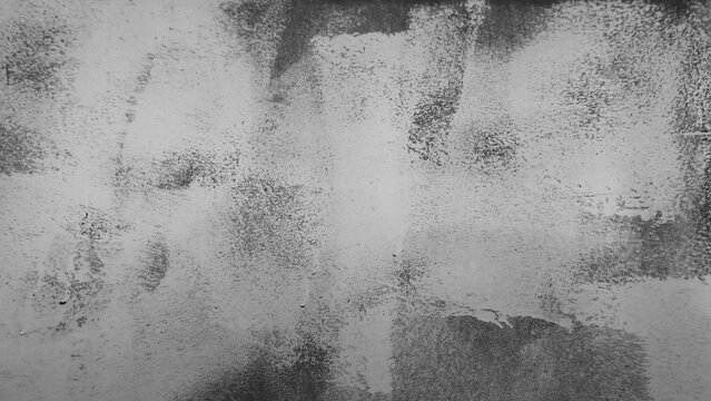 gray background, in the photo there is a wall and strokes of white paint