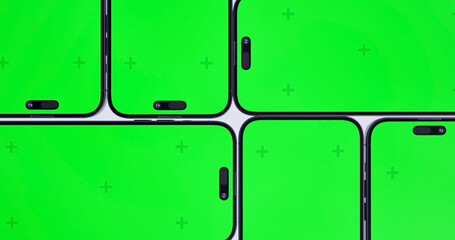 Smartphones with blank green screen into the frame. Modern frameless design