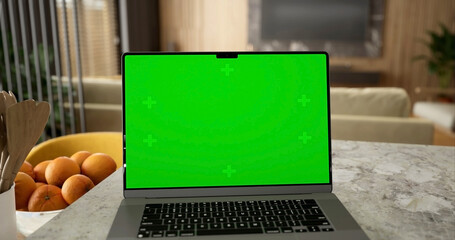 Laptop place on room table, Green screen display, Close up monitor of notebook with mock up - 756588617