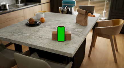 Smartphone place on kitchen table, Green screen telephone, Close up display mobile phone with mock up, Chroma key monitor
