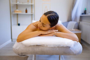 Tranquil Female Resting on Massage Table