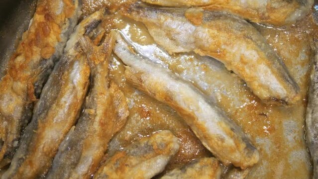 Fried Fish In Pan. Fish Frying In Oil. Roasted Seafood Cuisine 4K
