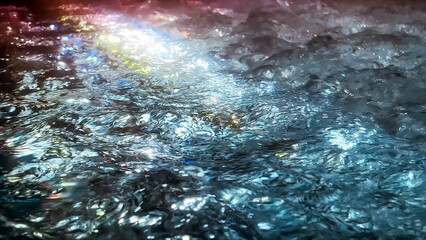 Close up of water bubbling in outdoor hot thermal pool